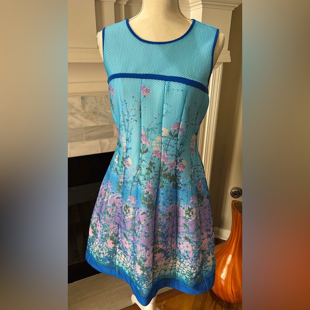 Floral Blue Sleeveless Dress by Gabby Skye